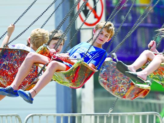 CARNIVAL SWINGS INTO TOWN