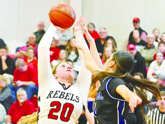 REBELS BATTLE PAST WILDCATS
