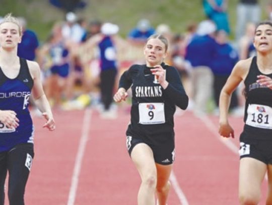 Two Spartans race on the oval in Omaha