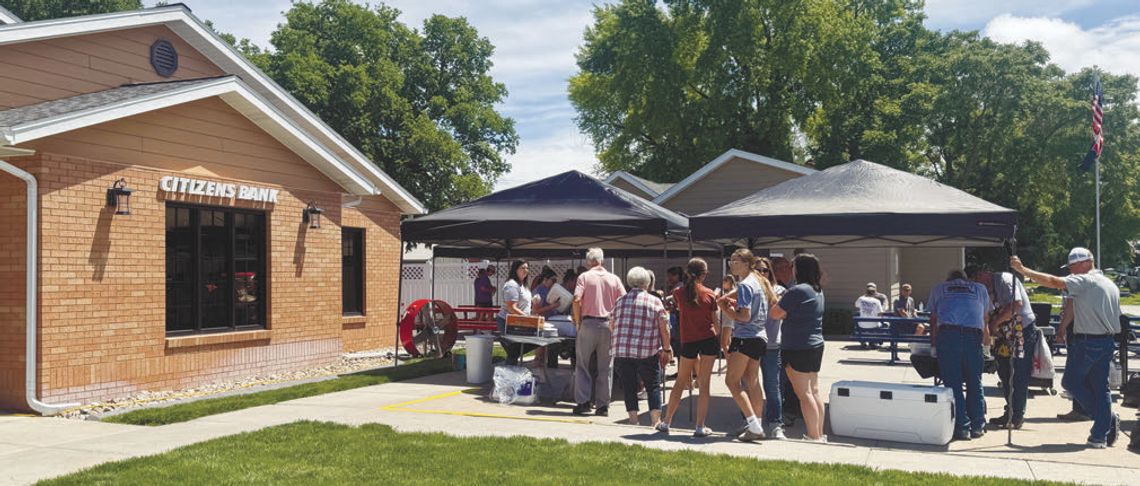 BANK GRILLS UP A GOOD TIME BANK GRILLS UP A GOOD TIME