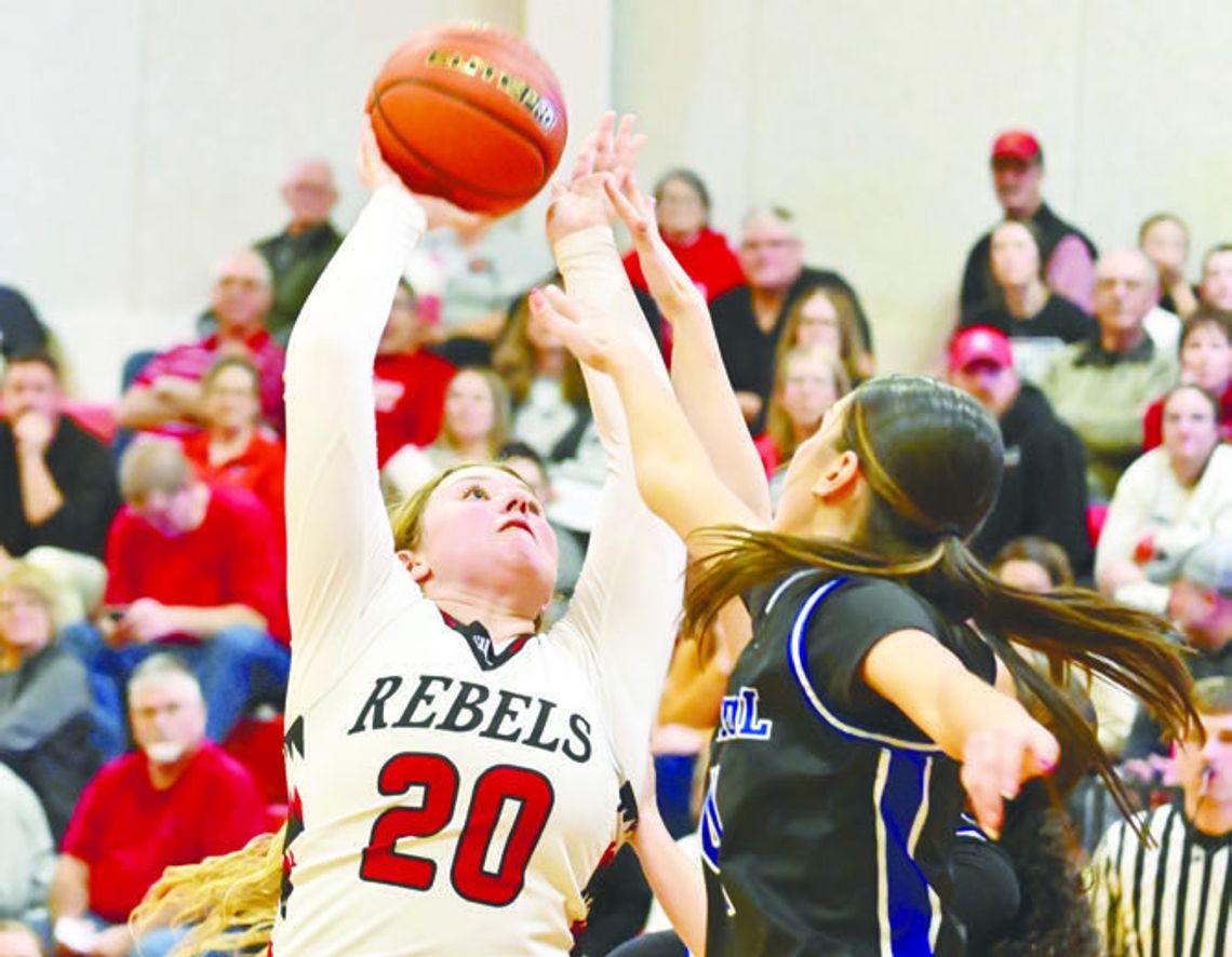 REBELS BATTLE PAST WILDCATS